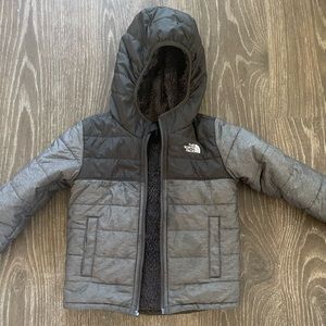 The North Fact reversible Puffer excellent condition.